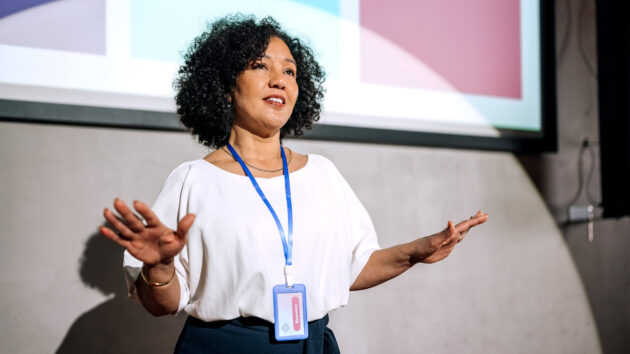 Businesswoman giving a speech at a conference